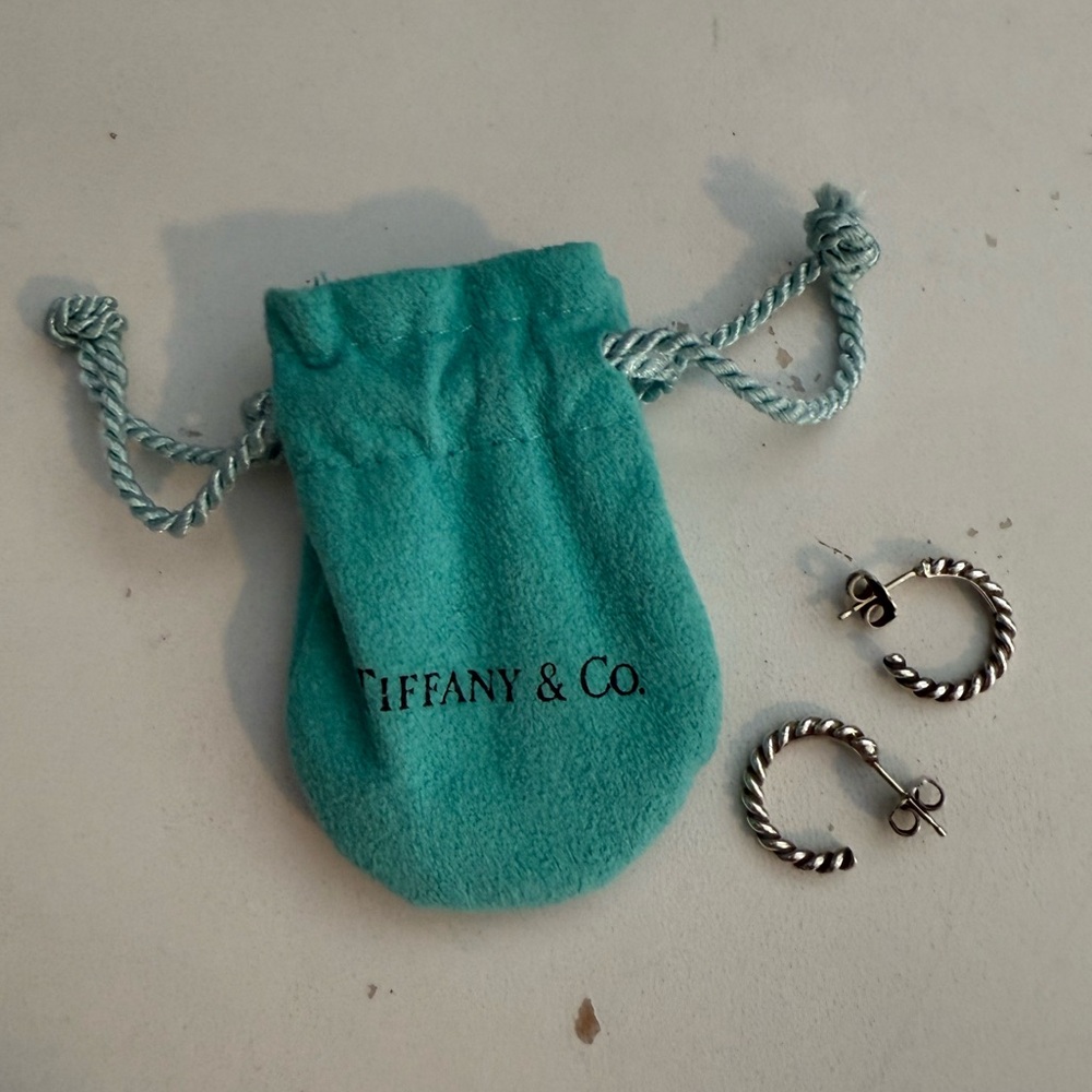 Tiffany & Co sterling silver twist hoop earring